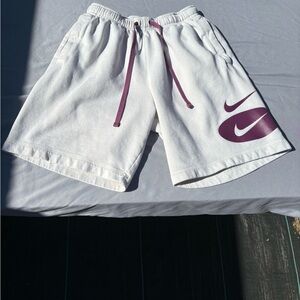 Nike Men's White Shorts with Purple Accents